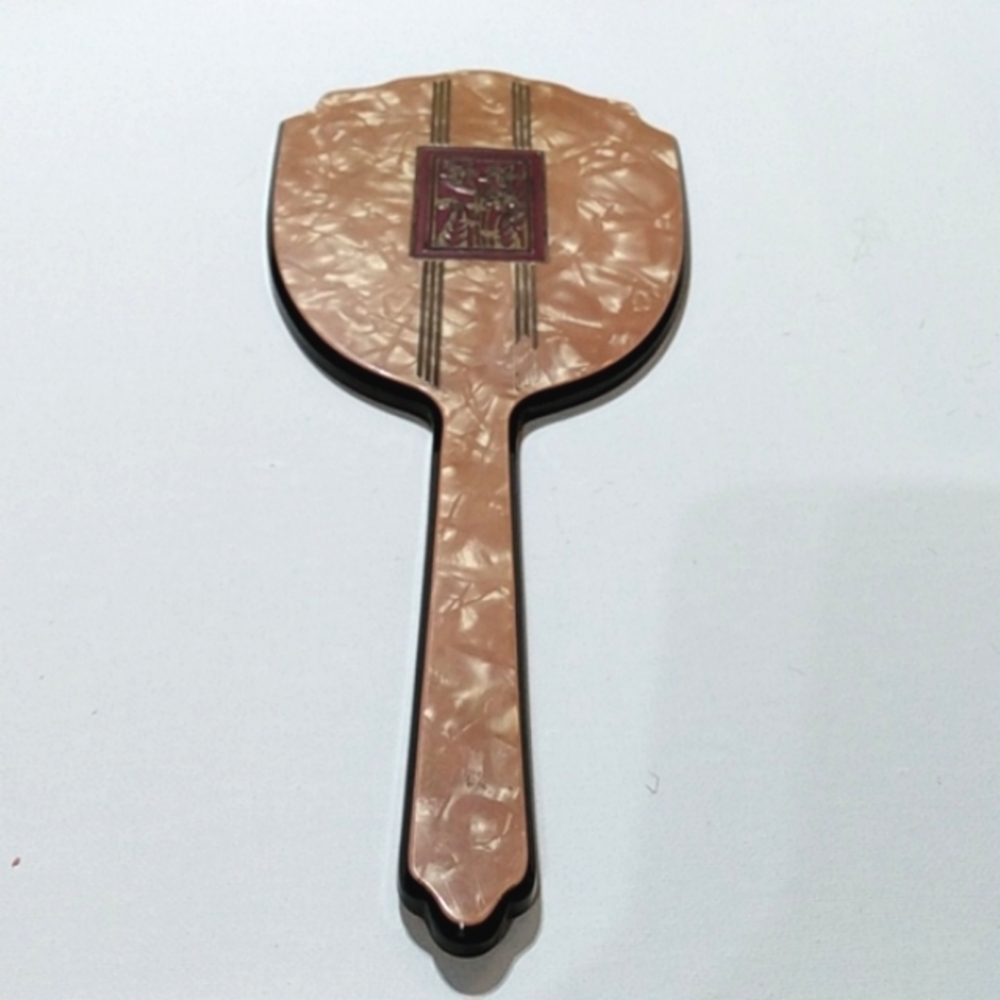 Coral marbled celluloid Dupont hand mirror